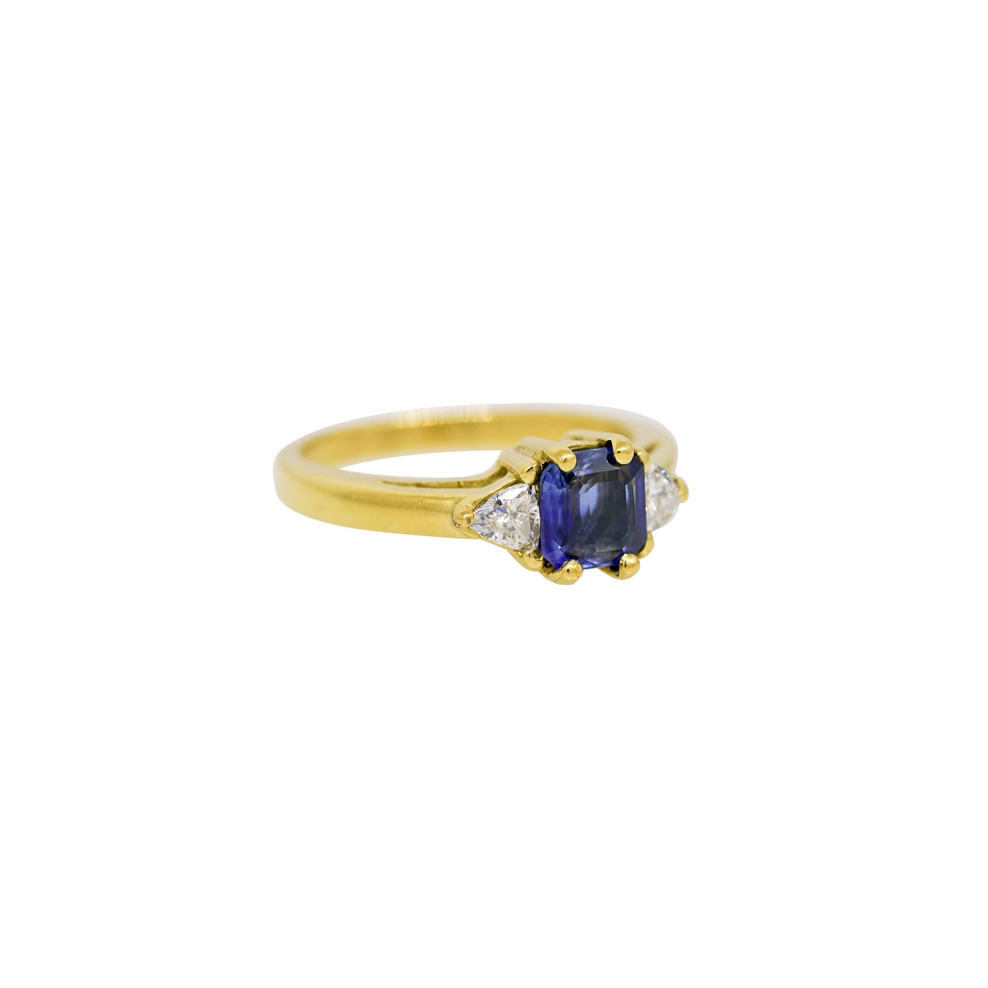 Emerald Cut Sapphire & Trillion Cut Diamond Side Stone 18 Karat Ring In Stock In Excellent Condition For Sale In Boca Raton, FL