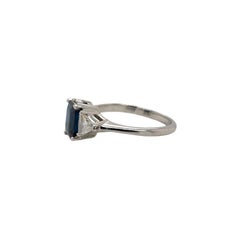 Emerald Cut Sapphire & Trillion Diamond Ring in 18K White Gold