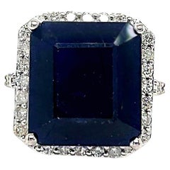 Emerald Cut Sapphire with Diamond Halo Statement Ring