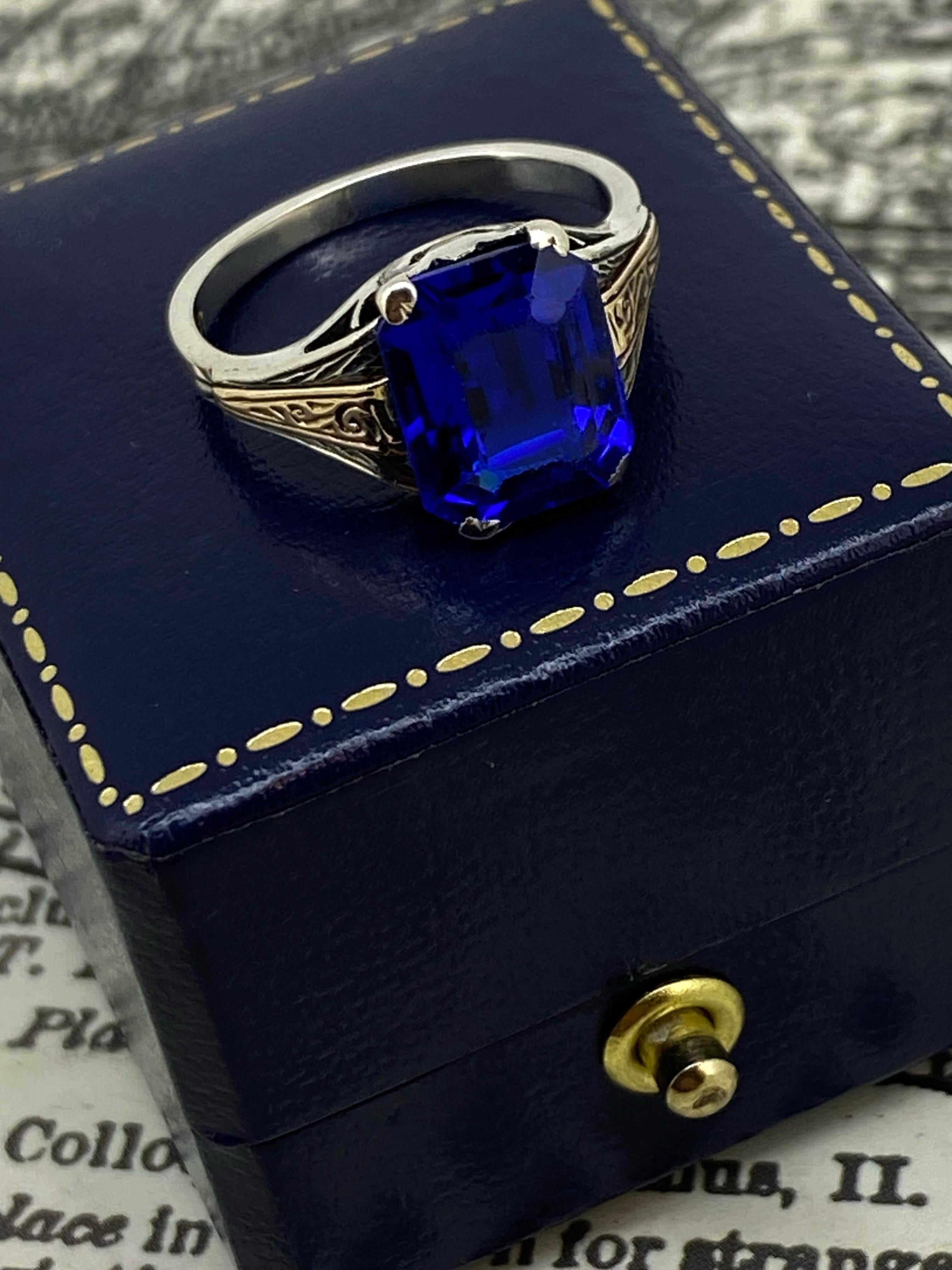 Women's Emerald Cut Synthetic Sapphire Solitaire Retro Ring in 9K Yellow & White Gold For Sale