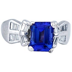 Bague en platine avec tanzanite taille émeraude et diamants baguette