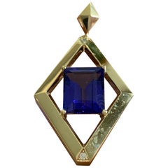 Emerald Cut Tanzanite and Diamond Pendant 14 Karat Yellow Gold, Ben Dannie