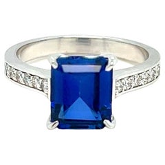 Emerald Cut Tanzanite and Diamond Ring , 3.20 ctw.