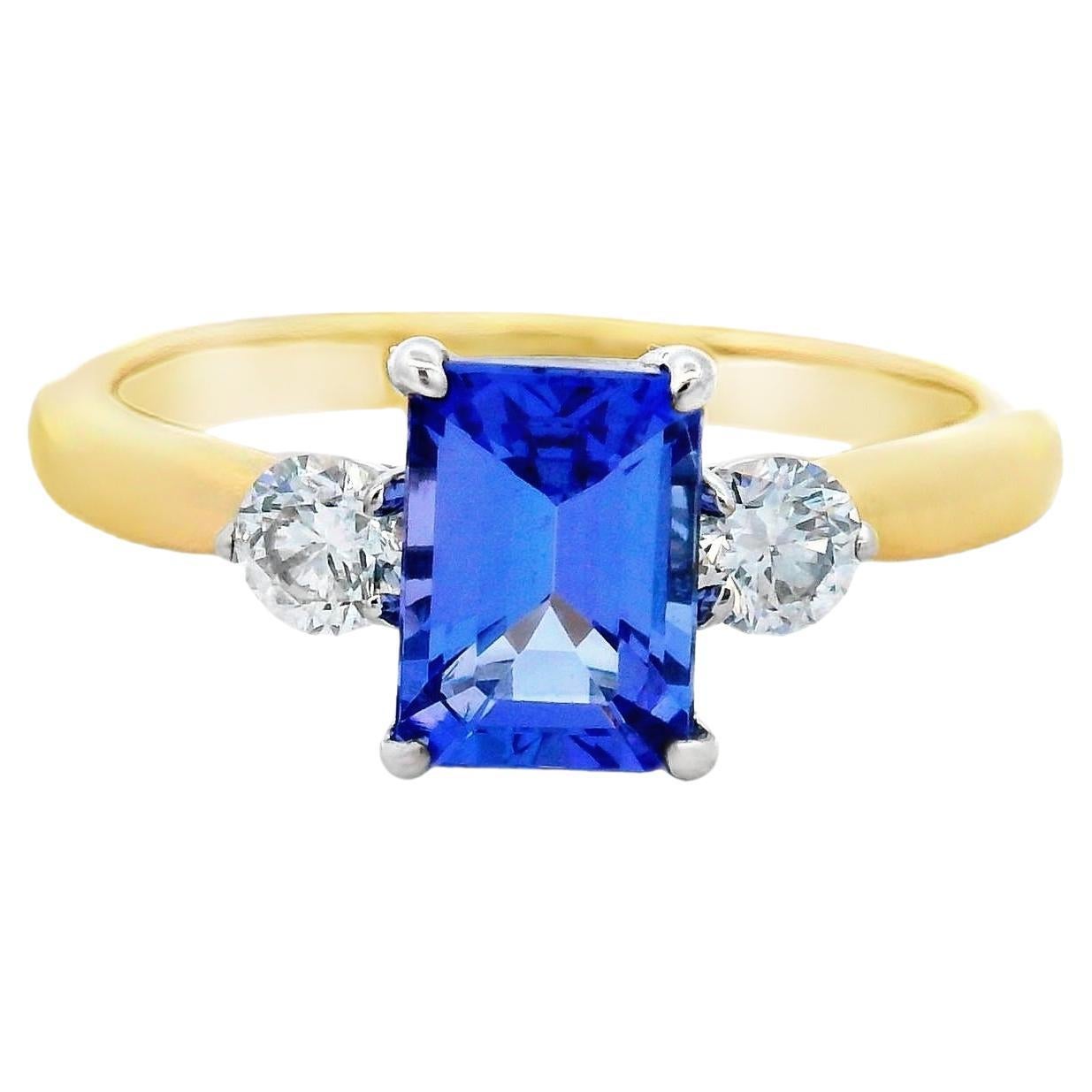 Anello con tanzanite taglio smeraldo e diamante in oro 14K bicolore 1,27 carati totali