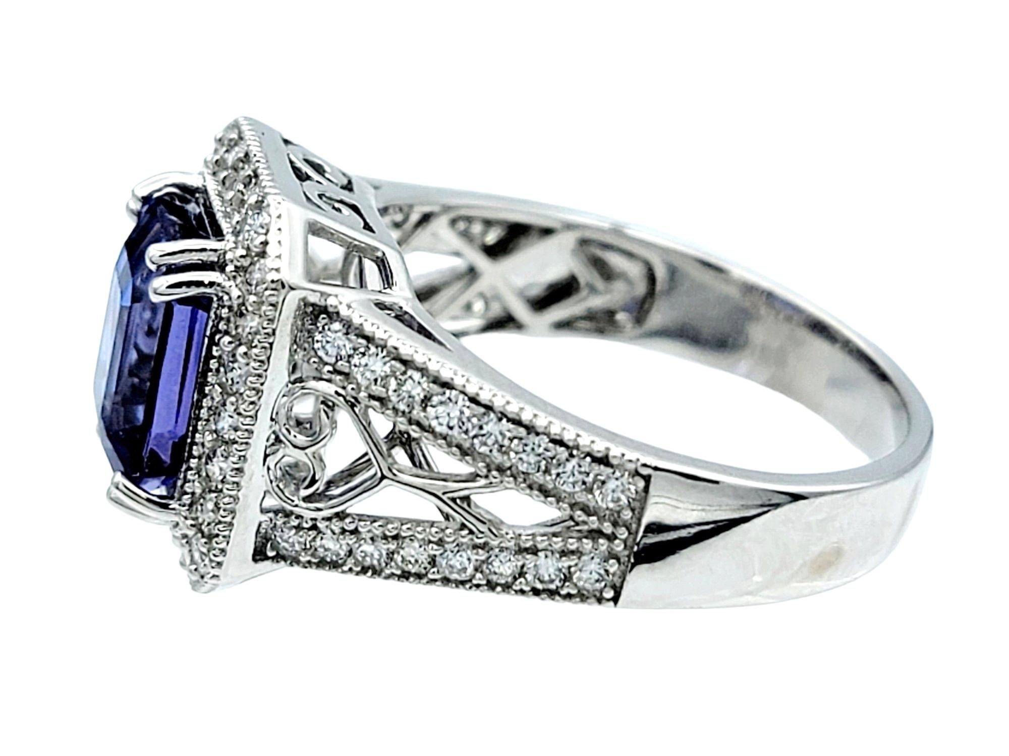 Emerald Cut Tanzanite & Diamond Halo Ring with Milgrain Detail in 18 Karat Gold In Good Condition For Sale In Scottsdale, AZ