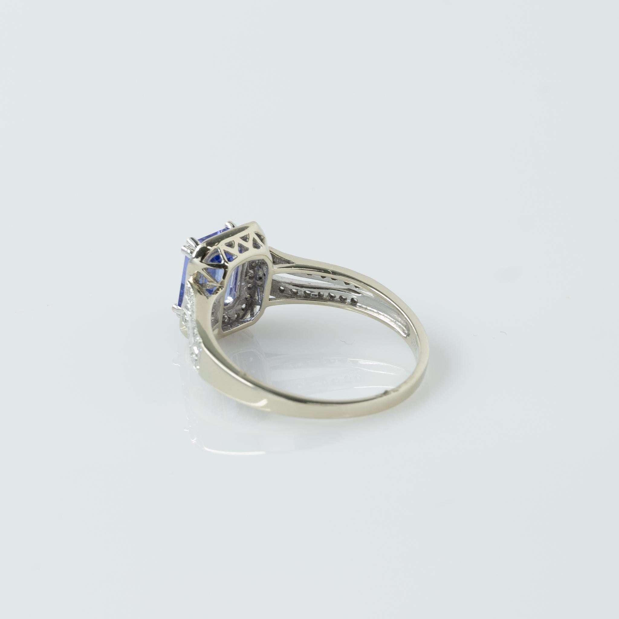 Emerald Cut Tanzanite in Diamond Halo Split Shank 14K White Gold Ring In Good Condition In Addison, TX
