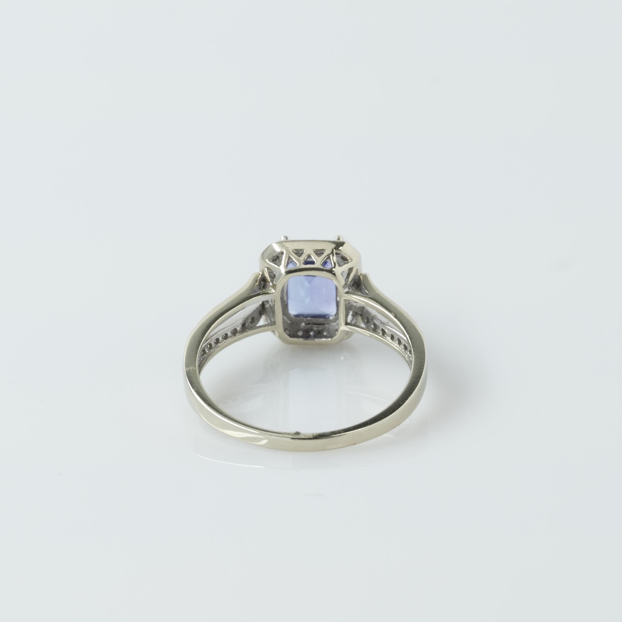 Women's Emerald Cut Tanzanite in Diamond Halo Split Shank 14K White Gold Ring