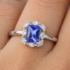 Emerald Cut Tanzanite SI/H Diamond Halo 14 Karat White Gold Ring