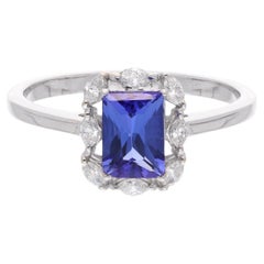 Emerald Cut Tanzanite SI/H Diamond Halo 14 Karat White Gold Ring