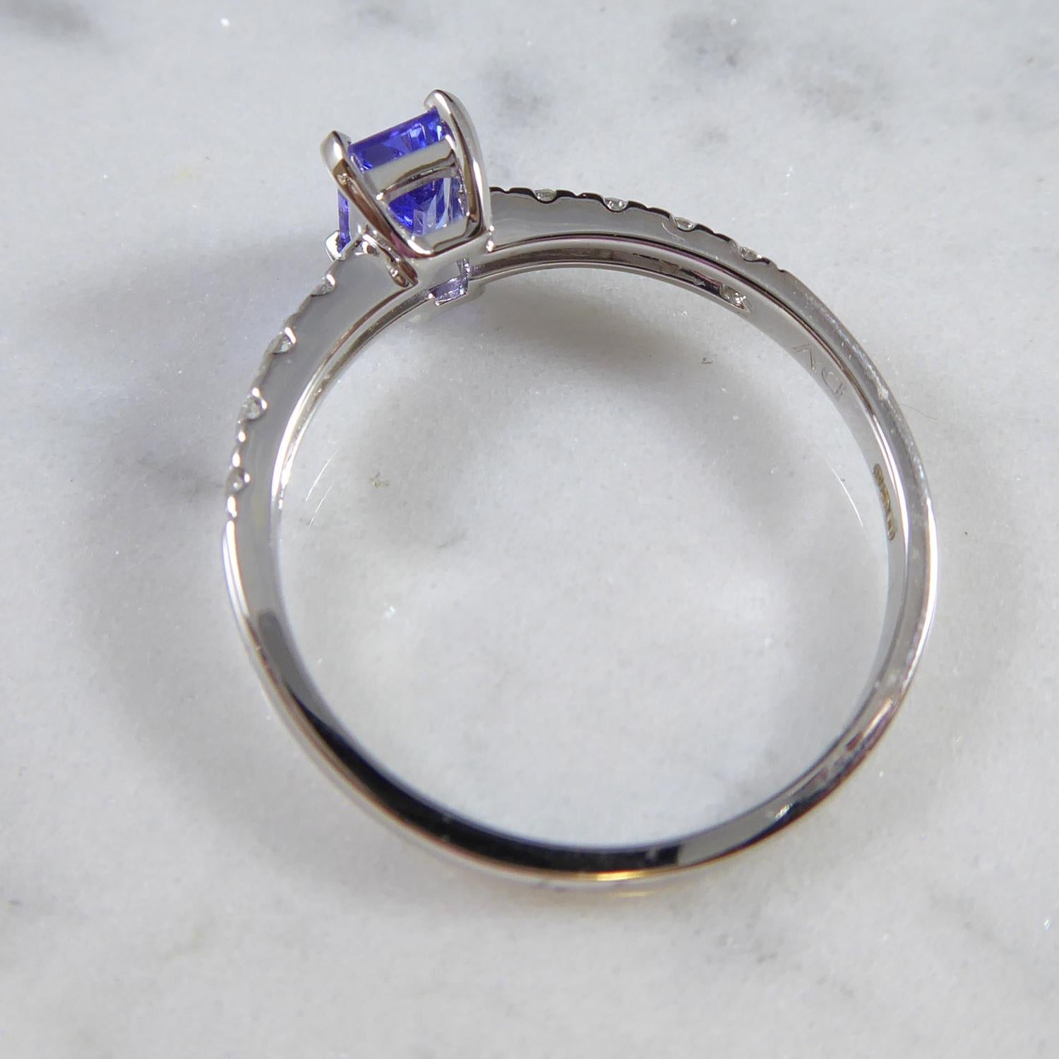 Emerald Cut Tanzanite Solitaire Ring, Diamond Shoulders, 18ct White Gold In New Condition In Yorkshire, West Yorkshire