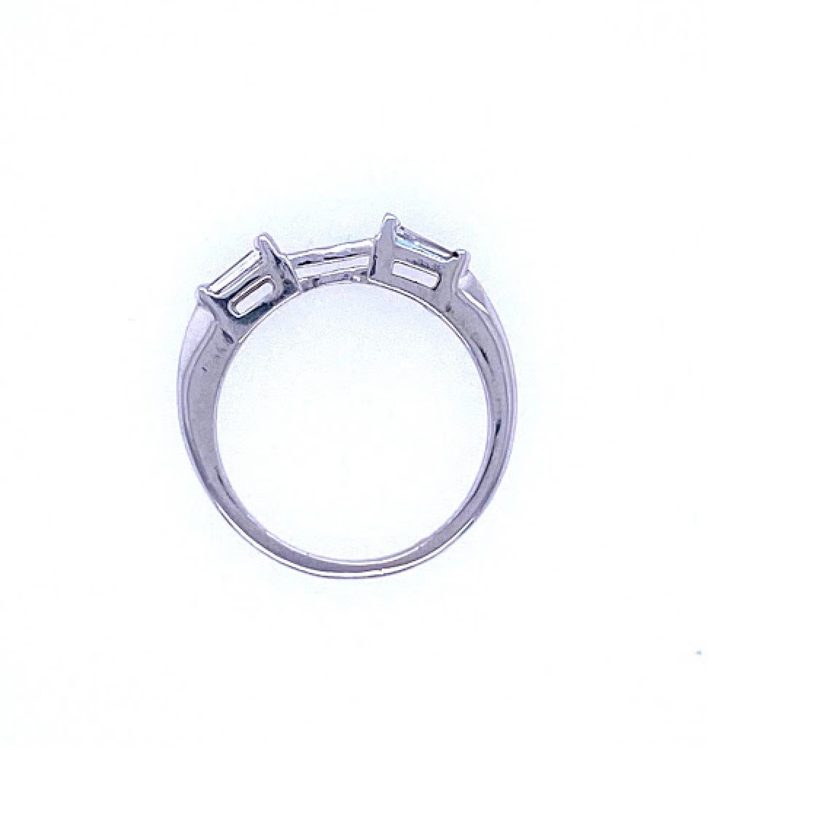 Women's Emerald Cut Three-Stone Engagement Ring