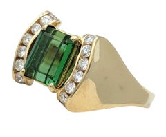 Emerald Cut Tourmaline and Channel Set Diamond Ring in 14 Karat Yellow Gold
