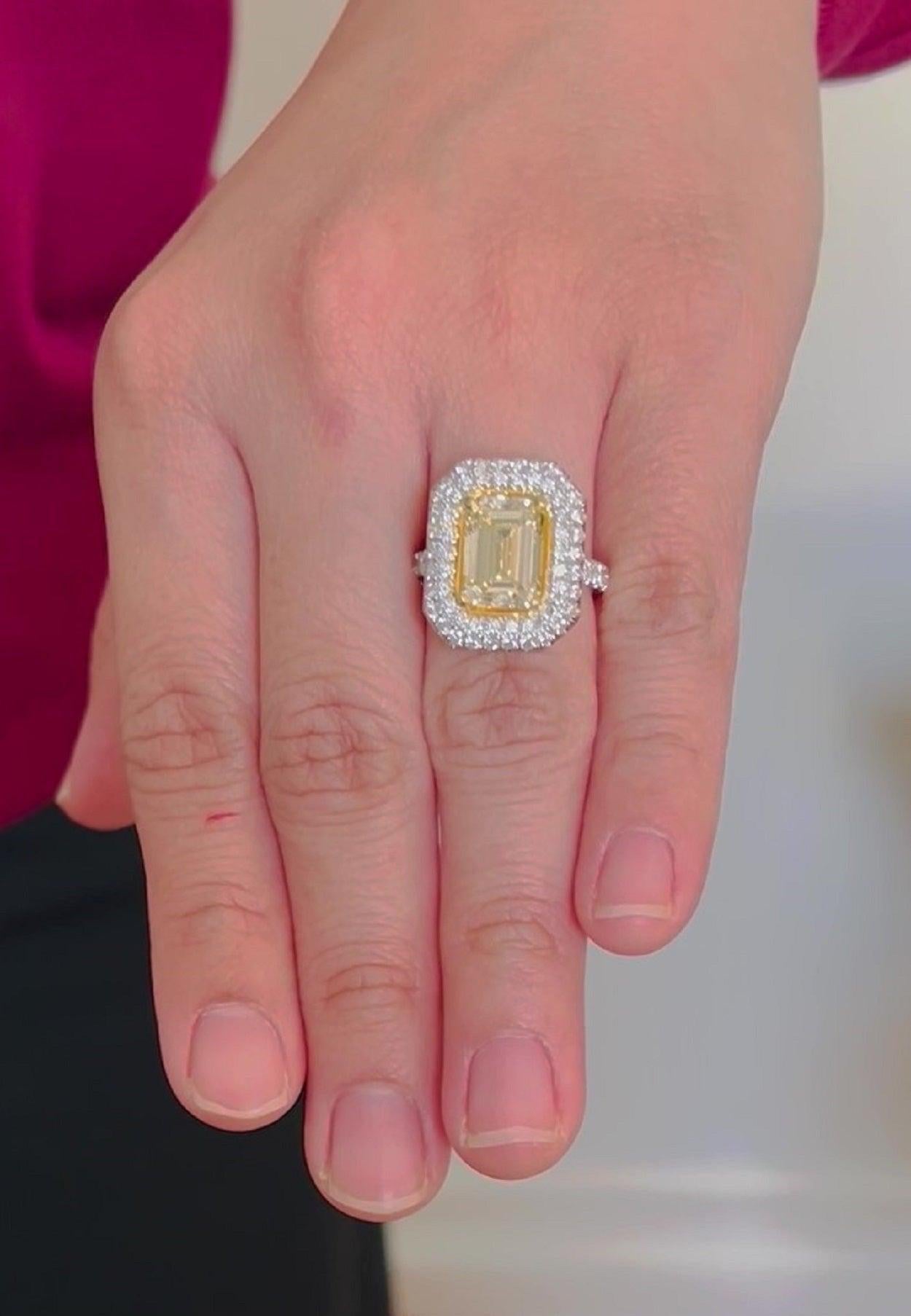 Contemporary Emerald Cut Yellow Diamond Ring 4.01 Carats Plat/18KY GIA Certified