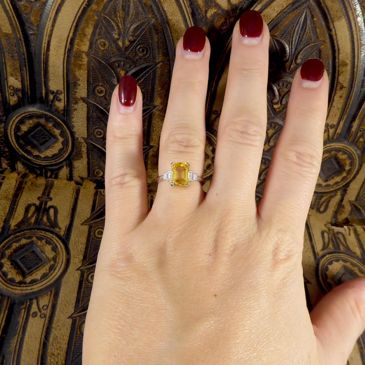 emerald cut yellow sapphire ring