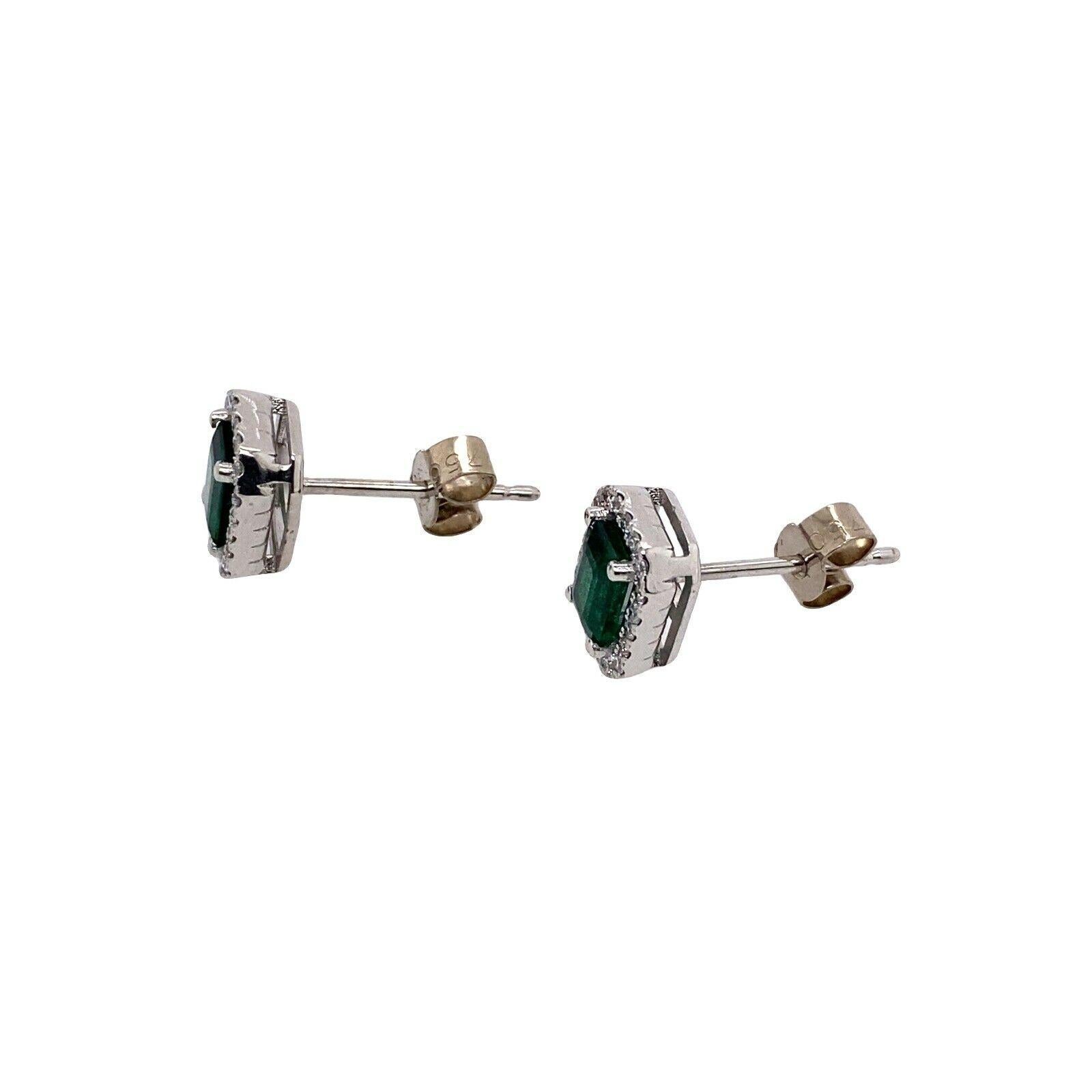Emerald Cut Zambian Emeralds Surrounded by Diamonds Set in 18ct White Gold For Sale 1