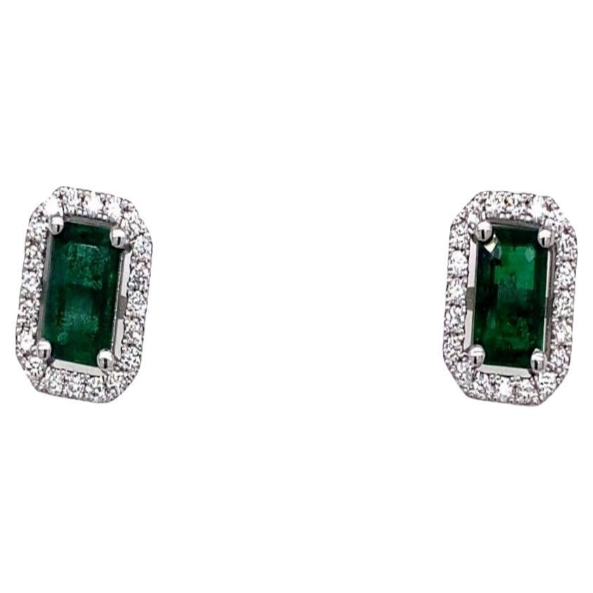 Emerald Cut Zambian Emeralds Surrounded by Diamonds Set in 18ct White Gold For Sale