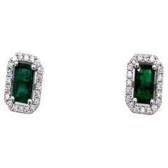 Emerald Cut Zambian Emeralds Surrounded by Diamonds Set in 18ct White Gold