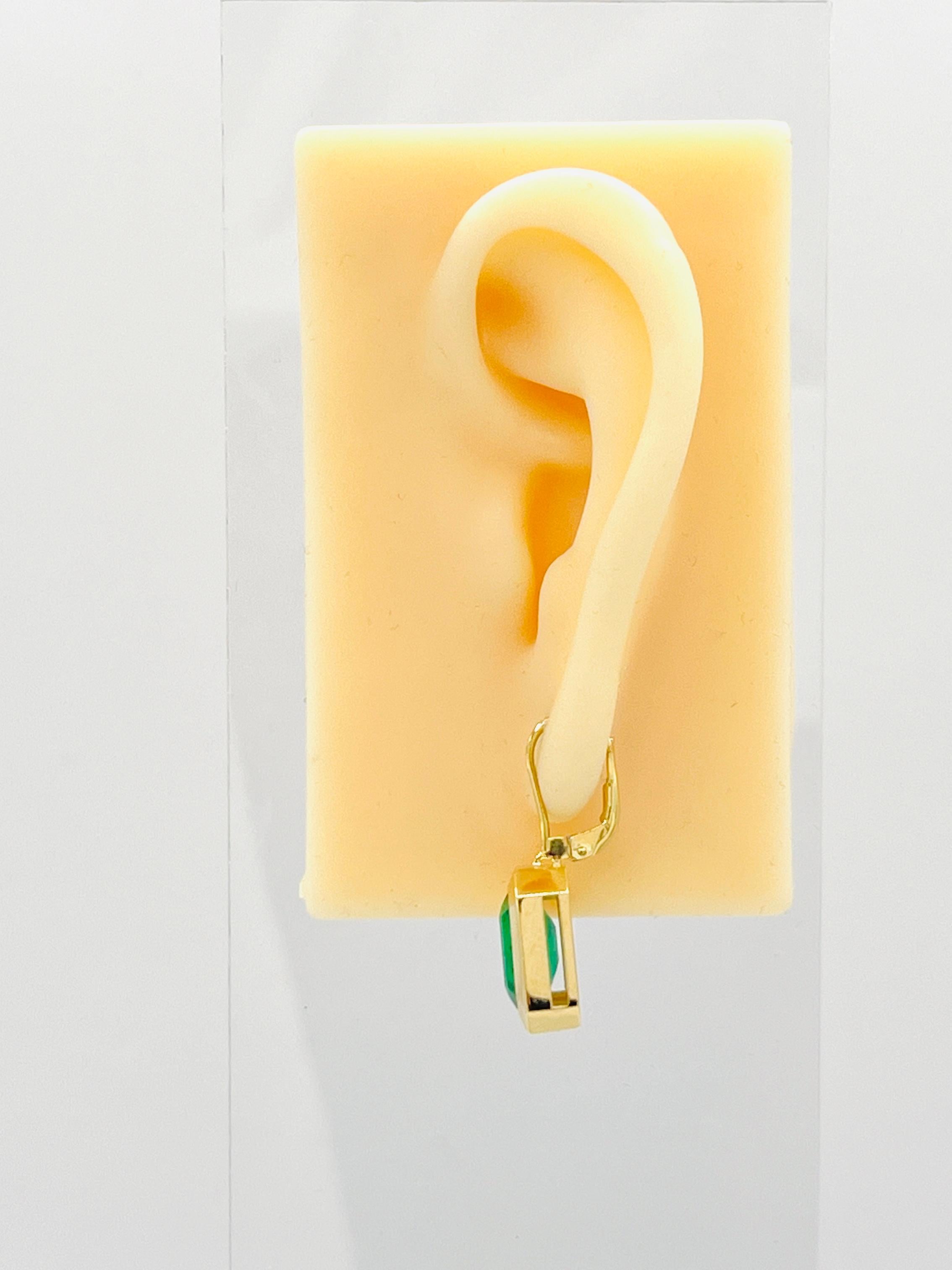 Emerald Cut Emerald Dangle Earrings in 18K Yellow Gold For Sale