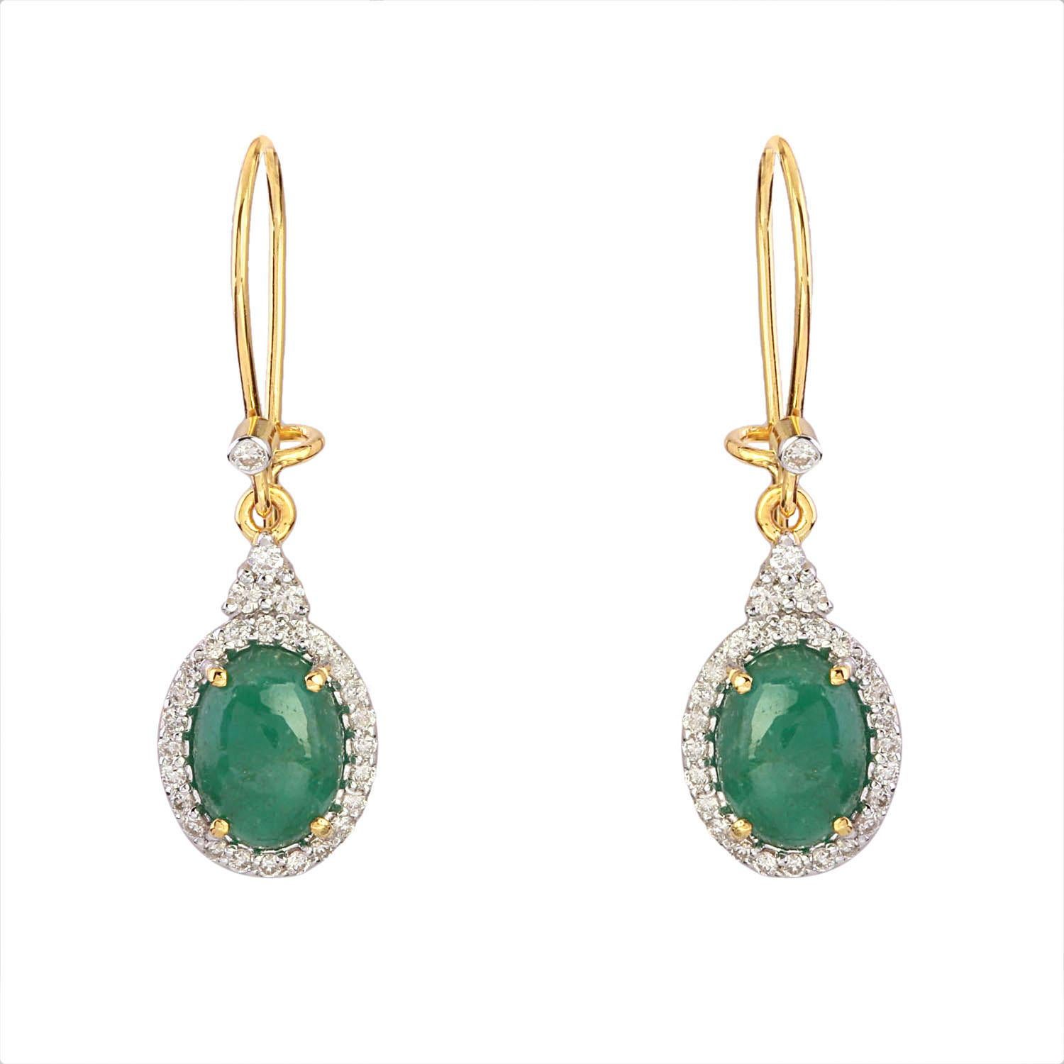 Feast your eyes on these vivid Emerald Gemstone Hook Earrings encircled by 0.38 Carat Natural Diamonds. The hook and suspension are made with pure 14K Yellow Gold. Pair yours with everything – these wonders can take you through day and night