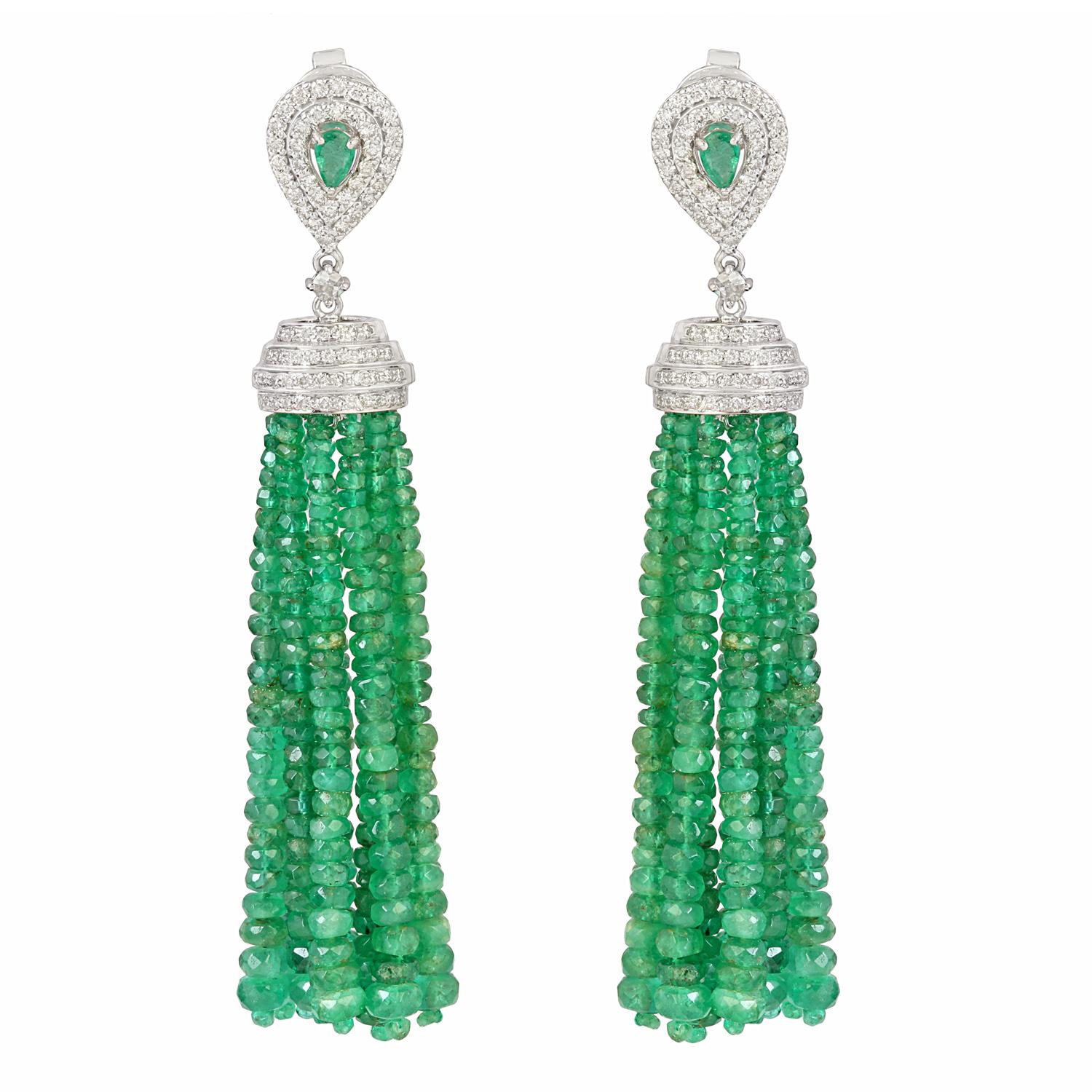 Feast your eyes on these vivid Emerald Gemstone Dangle Earrings encircled by Natural Diamonds. The hook and suspension are made with pure 18K Yellow Gold. Pair yours with everything – these wonders can take you through day and night
