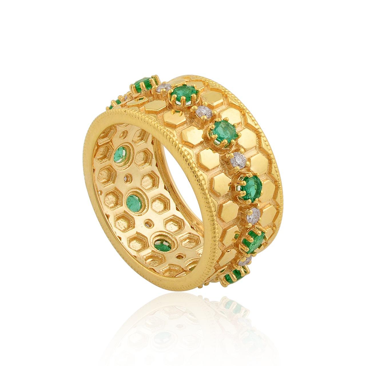 This ring has been meticulously crafted from 14-karat gold.  It is hand set with .78 carats emerald & .25 carats of sparkling diamonds. 

The ring is a size 7 and may be resized to larger or smaller upon request. 
FOLLOW  MEGHNA JEWELS storefront to