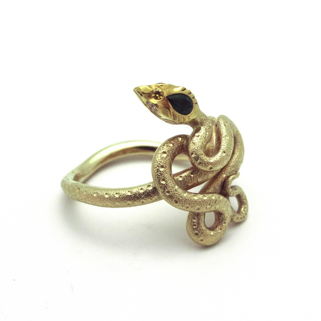 Textured 14k Gold Snake Ring with an 18k Gold and Emerald Head with Diamond Eyes. A great mythical piece with piercing eyes. It is dramatic and mesmerizing.