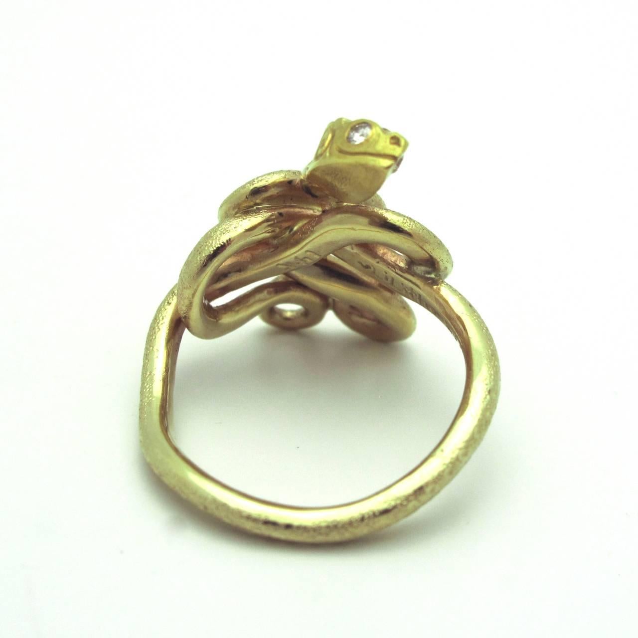 Modern Emerald Diamond 14 Karat Gold Snake Ring For Sale