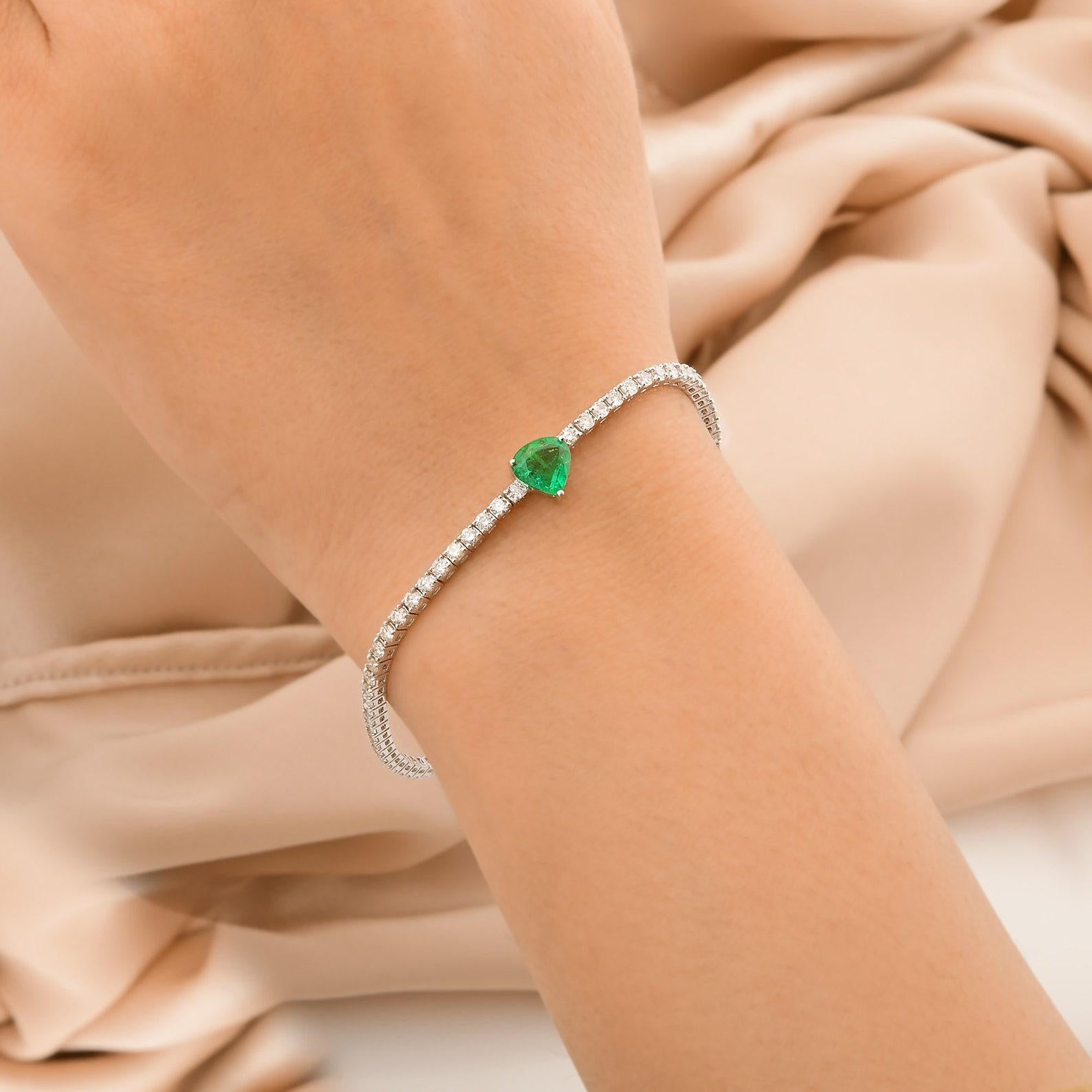 A beautiful bracelet handmade in 14K white gold. It is set in 1.23 carats of trillion shape emerald and 2.70 carats of sparkling diamonds. Wear it alone or stack it with your favorite pieces.

FOLLOW MEGHNA JEWELS storefront to view the latest