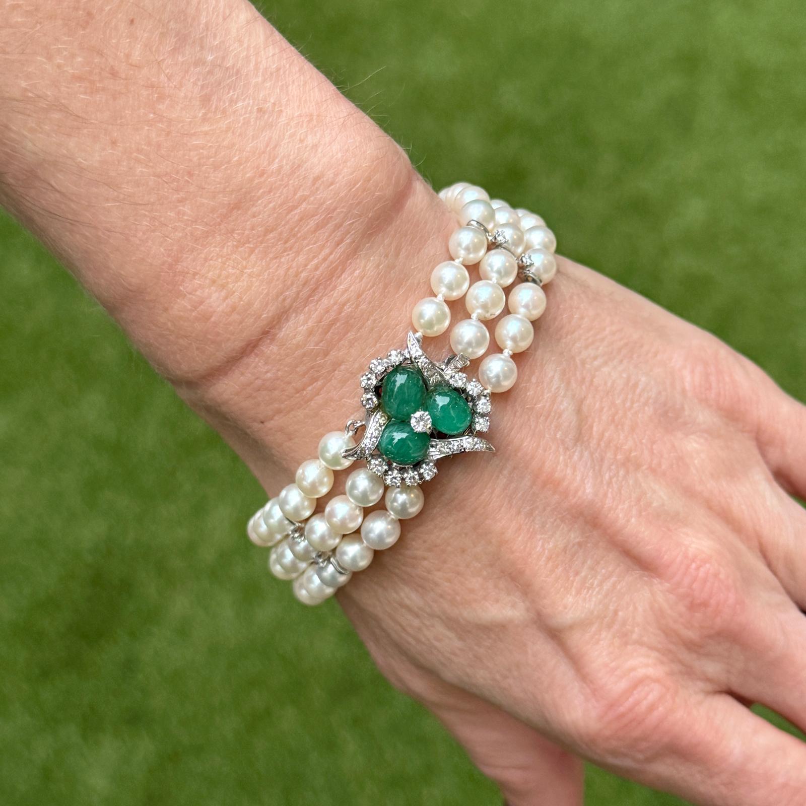 This exquisite vintage 14K white gold three-strand pearl bracelet exudes timeless elegance with its lustrous 13.6mm pearls and intricate detailing. Adorned with approximately 33 diamonds totaling 1.00 carat, graded H-I in color and SI in clarity,