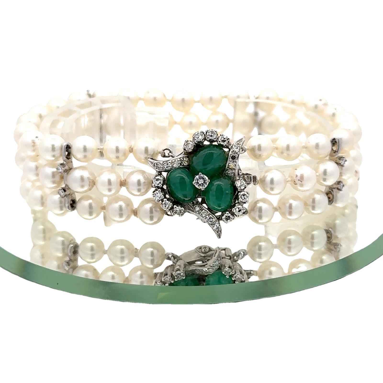 Contemporary Emerald Diamond 14 Karat White Gold Clasp Three Strand Pearl Bracelet