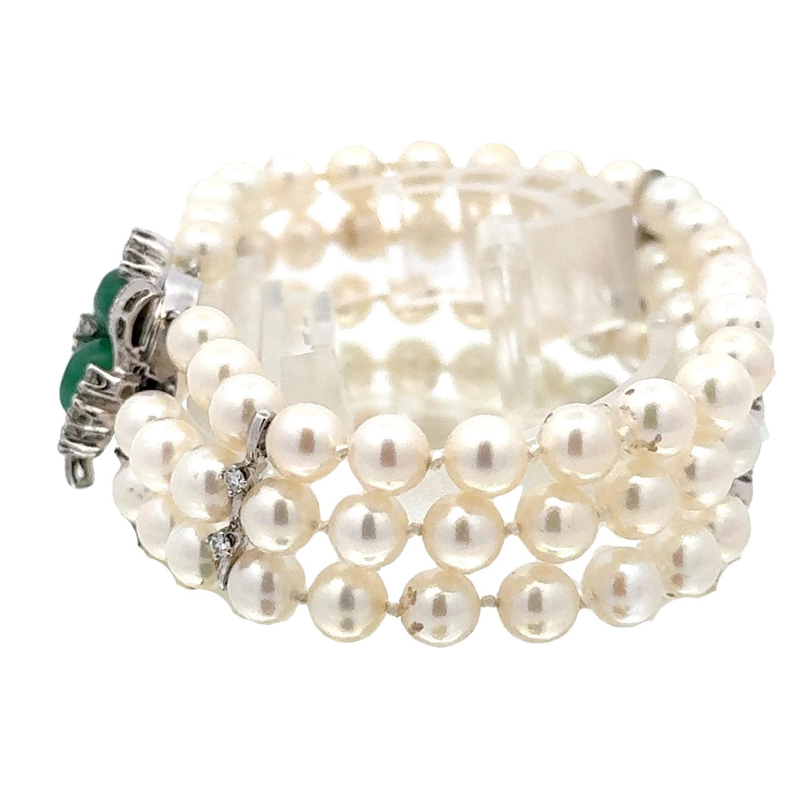 Women's Emerald Diamond 14 Karat White Gold Clasp Three Strand Pearl Bracelet