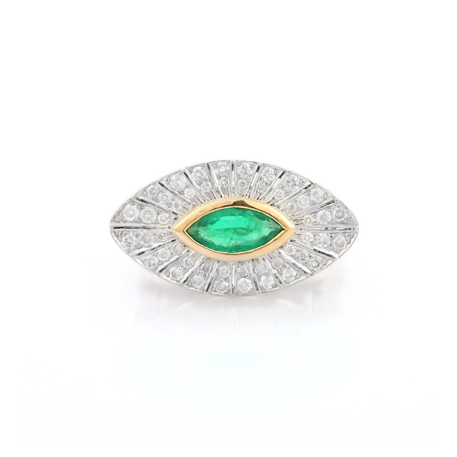 This ring has been meticulously crafted from 14-karat gold.  It is hand set with .76 carats emerald & .91 carats of sparkling diamonds. 

The ring is a size 7 and may be resized to larger or smaller upon request. 
FOLLOW  MEGHNA JEWELS storefront to