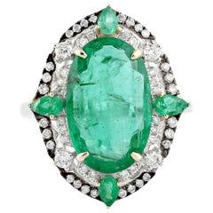 Ring aus 18 Karat Gold mit Smaragd und Diamant