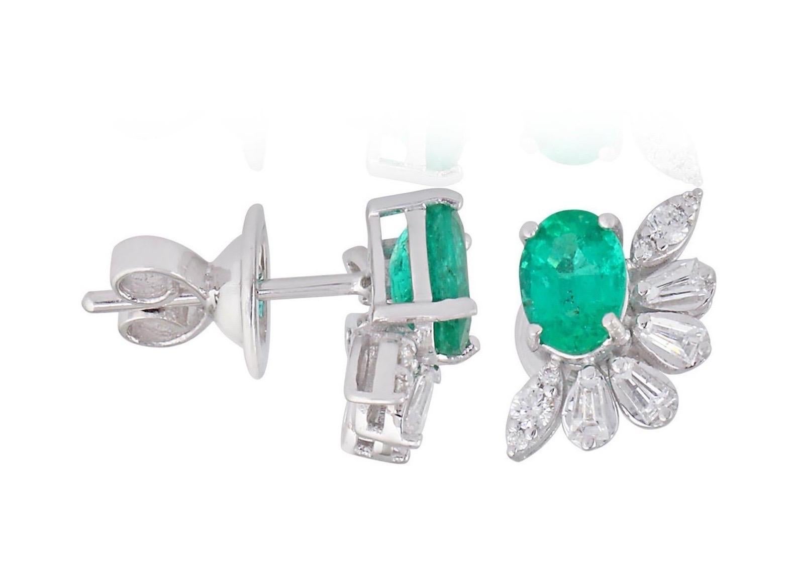 Cast in 18 karat gold, these stunning stud earrings are hand set with 1.85 carats emerald and .55 carats of glimmering diamonds. 

FOLLOW MEGHNA JEWELS storefront to view the latest collection & exclusive pieces. Meghna Jewels is proudly rated as a