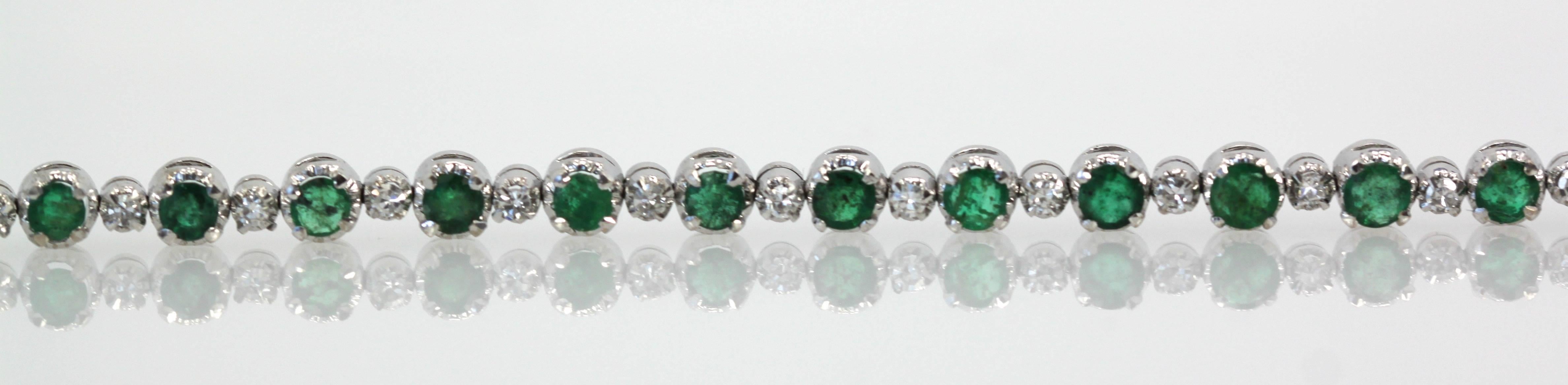 This lovely Emerald and Diamond Bracelet alternates between Emeralds and Diamonds in a filigree bezel setting.  The Emeralds are a gorgeous color green they are natural with visible inclusions.  This bracelet borders the line between vintage and