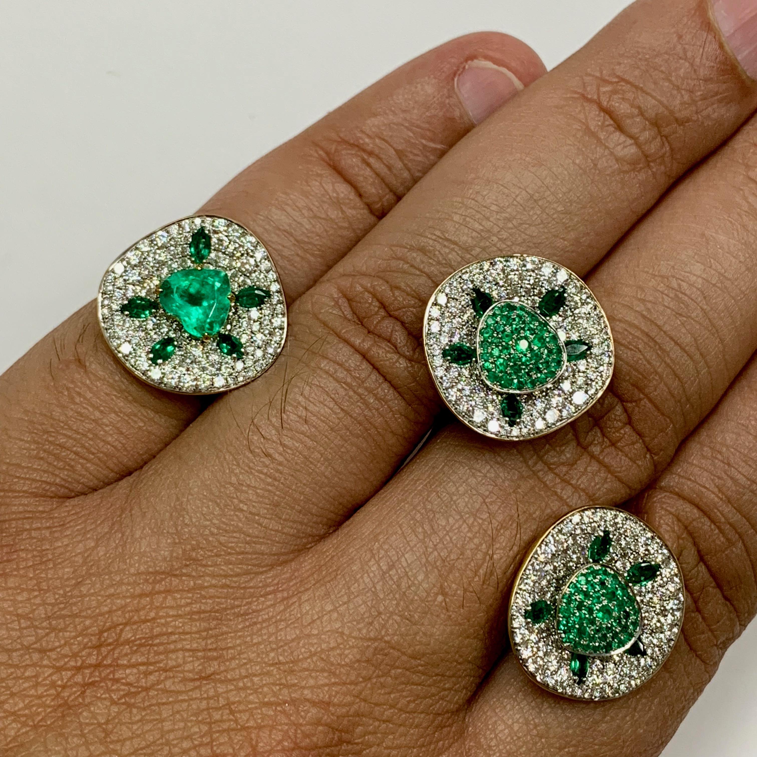 Emerald Diamond 18 Karat Yellow Gold Ring Earrings Suite

Emeralds and diamonds - always winning combination. Here we support the central Colombian Emerald of 1,37 carat with 1,93 carat of pure White Diamonds in the Ring. And melee Emerald of 1,24