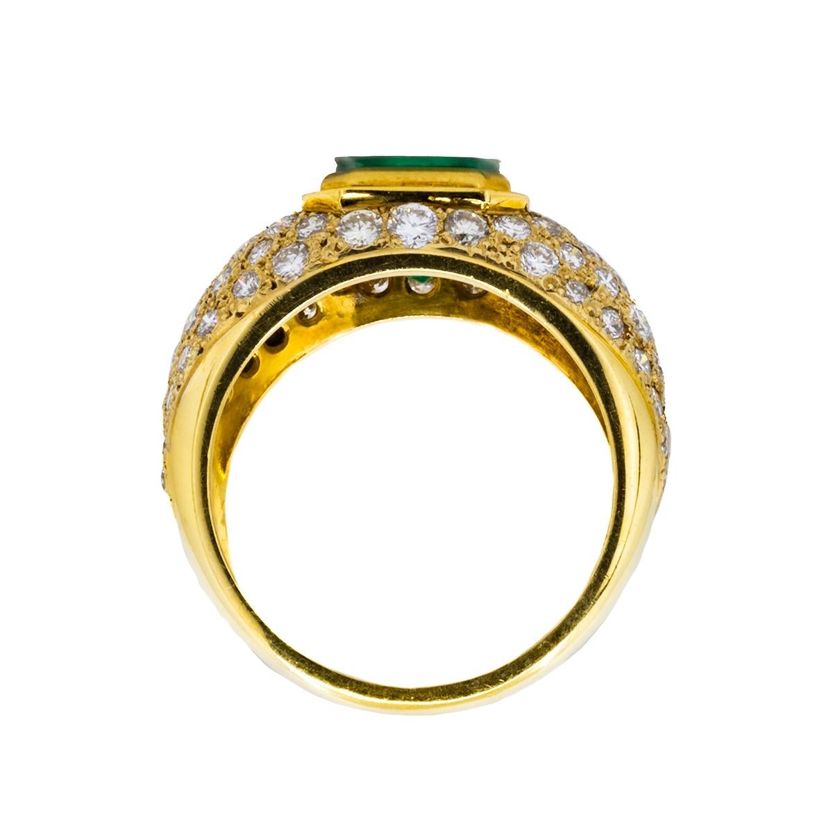 Beautiful 18k gold Ring with 1 Emerald Weighing 1.65 Carats and 74 Round Diamonds Weighing 2.76 Carats. We Offer Complementary Sizing with Each Purchase. 