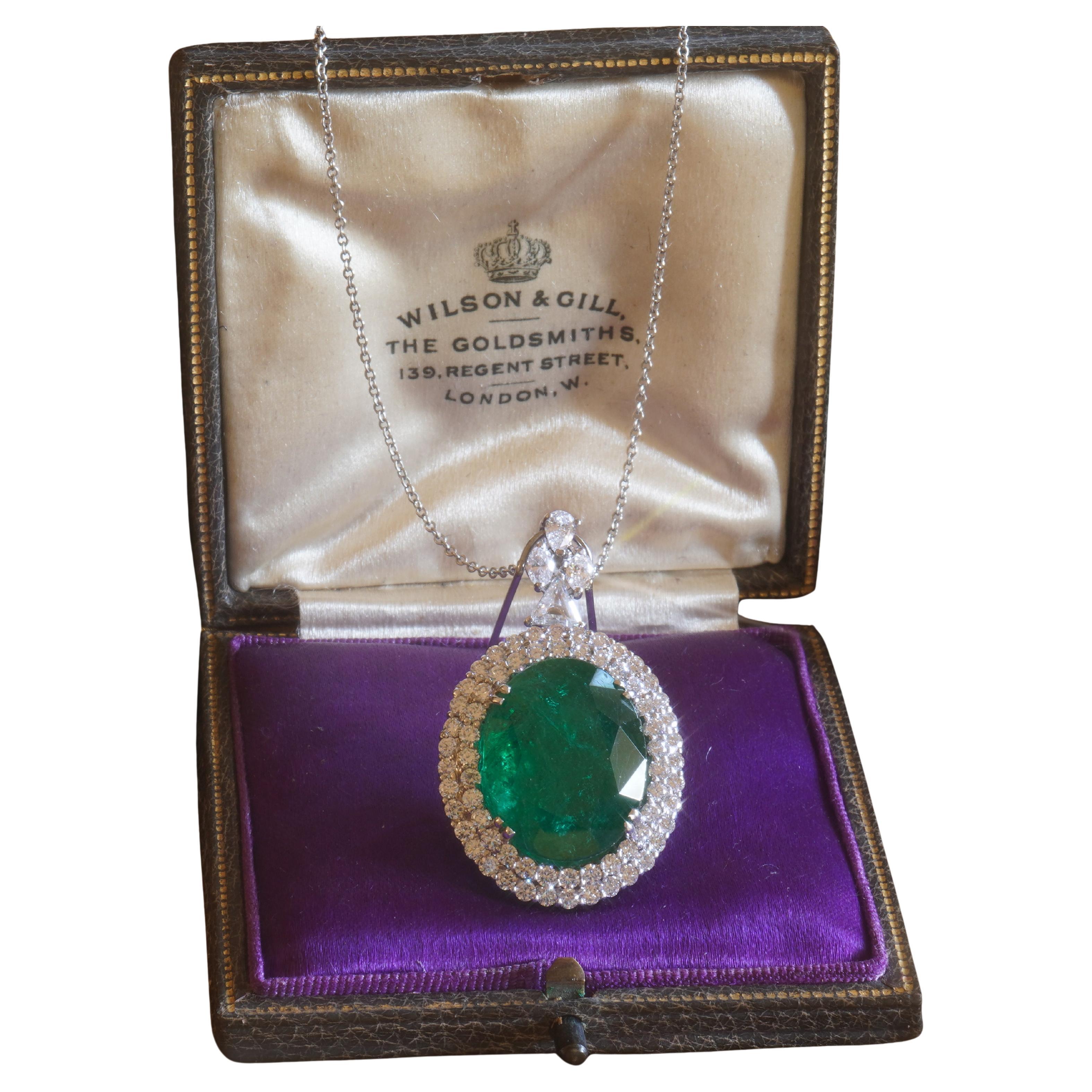 Old South Jewels proudly presents...VINTAGE LUXURY.     HUGE 18K VINTAGE 20.04 CARAT EMERALD DIAMOND CERTIFIED NECKLACE!   VINTAGE GLOWING 17.11 CARAT TRANSPARENT NATURAL EMERALD.  CROWNED WITH 2.93 CARATS OF VS SPARKLING WHITE EYE CLEAN DIAMONDS.  