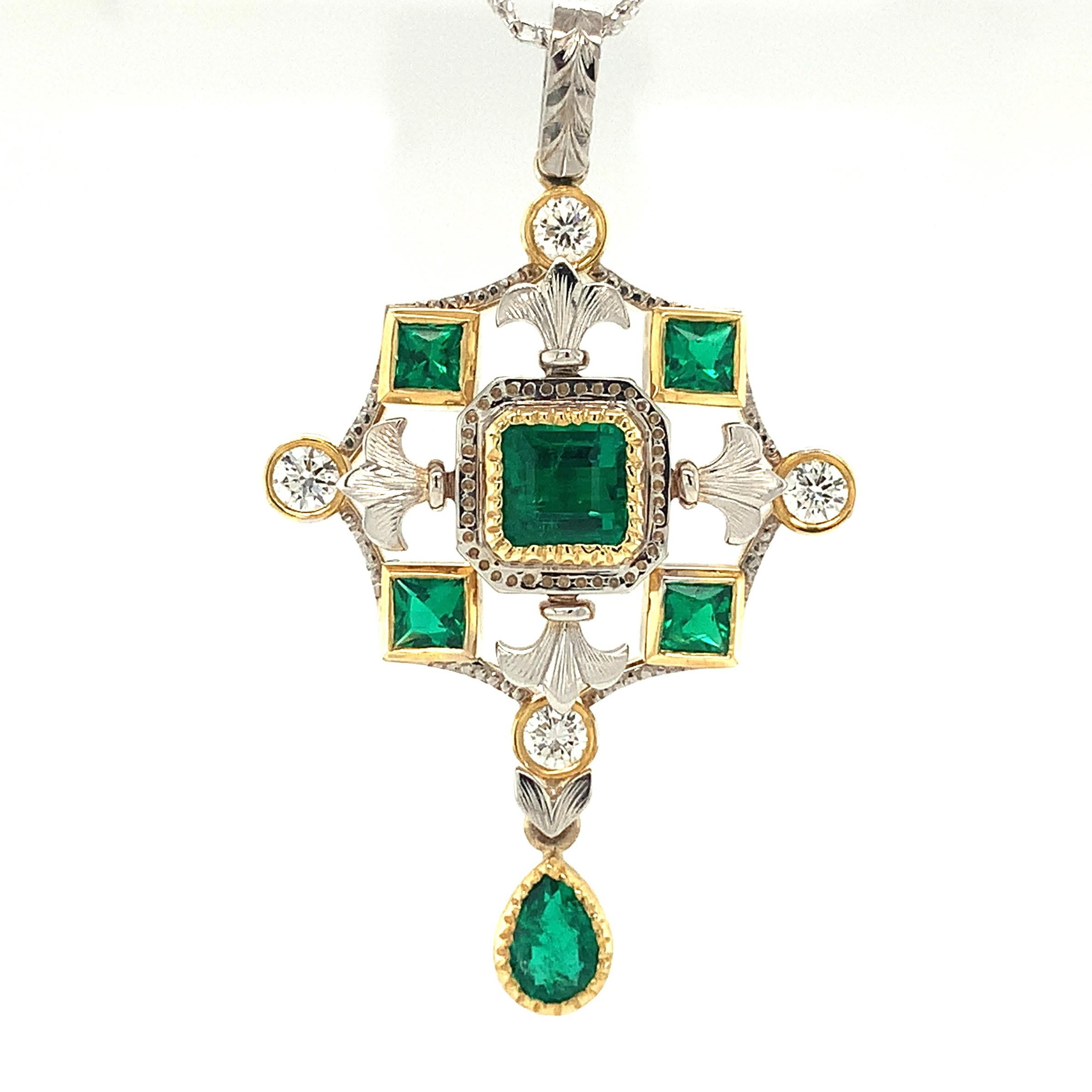 Rich, deep green emeralds in fancy square and pear shapes are set in this elegant pendant. It was handcrafted in 18k yellow and white gold with diamond accents by our Master Jewelers in Los Angeles. The level of craftsmanship and attention to detail