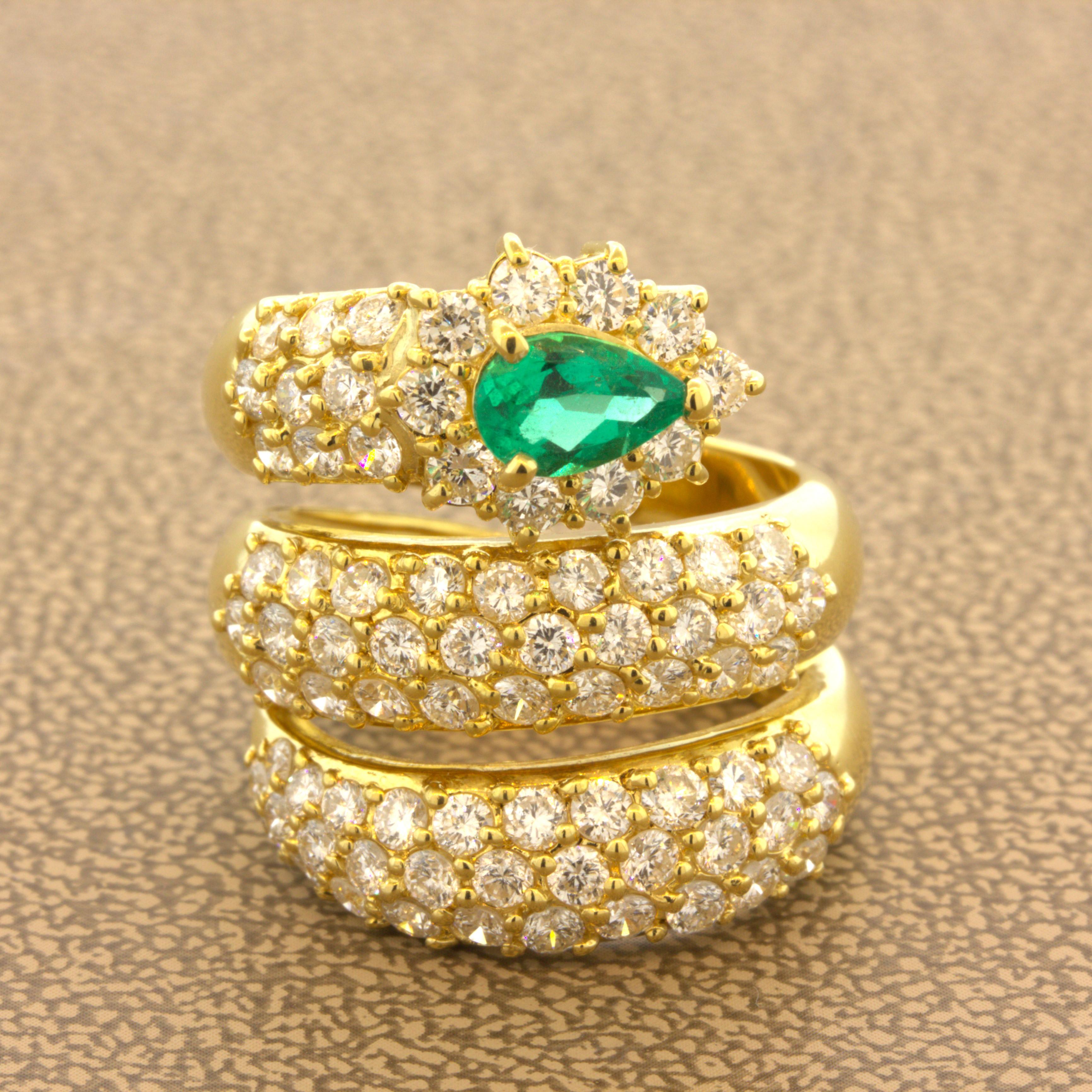Emerald Diamond 18k Yellow Gold Snake Ring

A sleek and stylish ring featuring fine gems set in 18k yellow gold. The head of the ring is set with a 0.51 carat pear-shape emerald with strong vivid grass green color. The body of the piece is blanketed