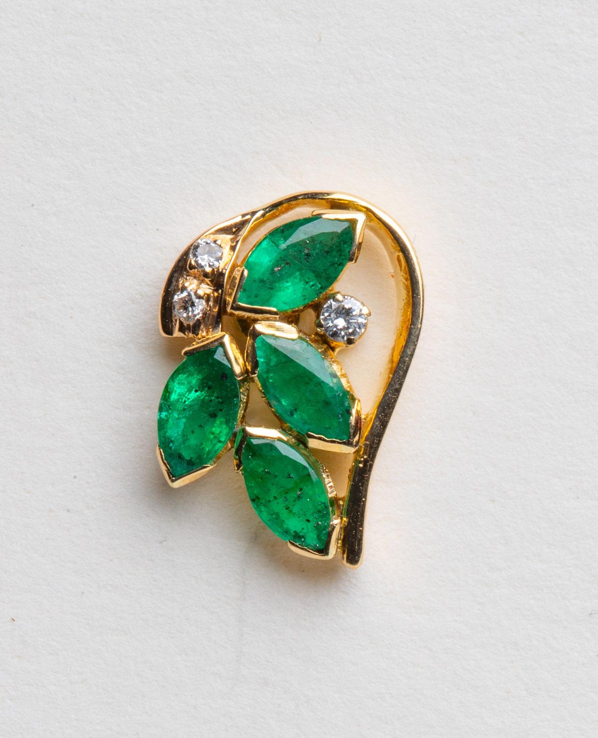 A lovely cluster of marquise cut emeralds with round, brilliant cut diamonds set in 18K gold, for pierced ears.