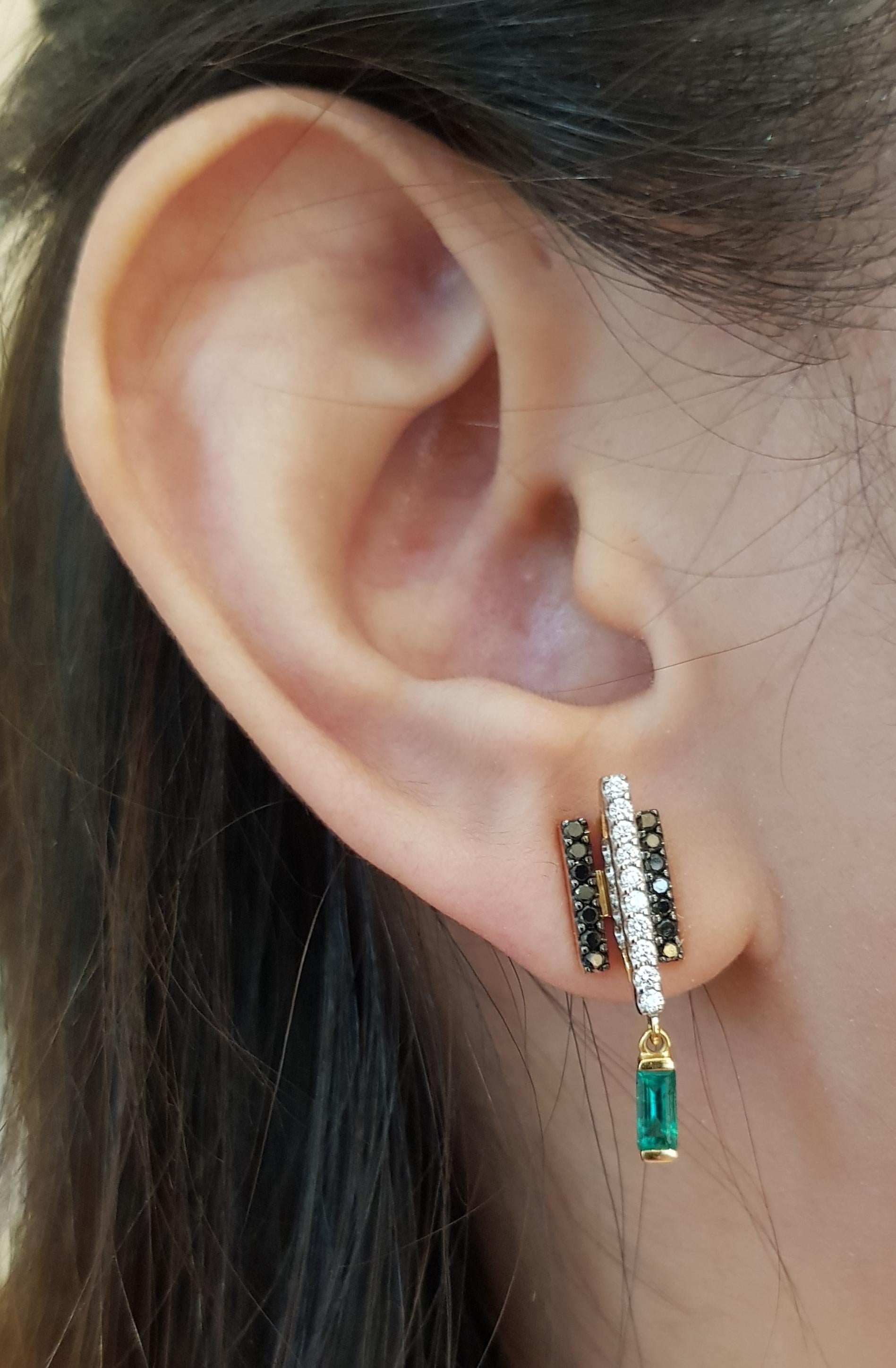 Contemporary Emerald, Diamond and Black Diamond Earrings in 18 Karat Gold by Kavant & Sharart For Sale
