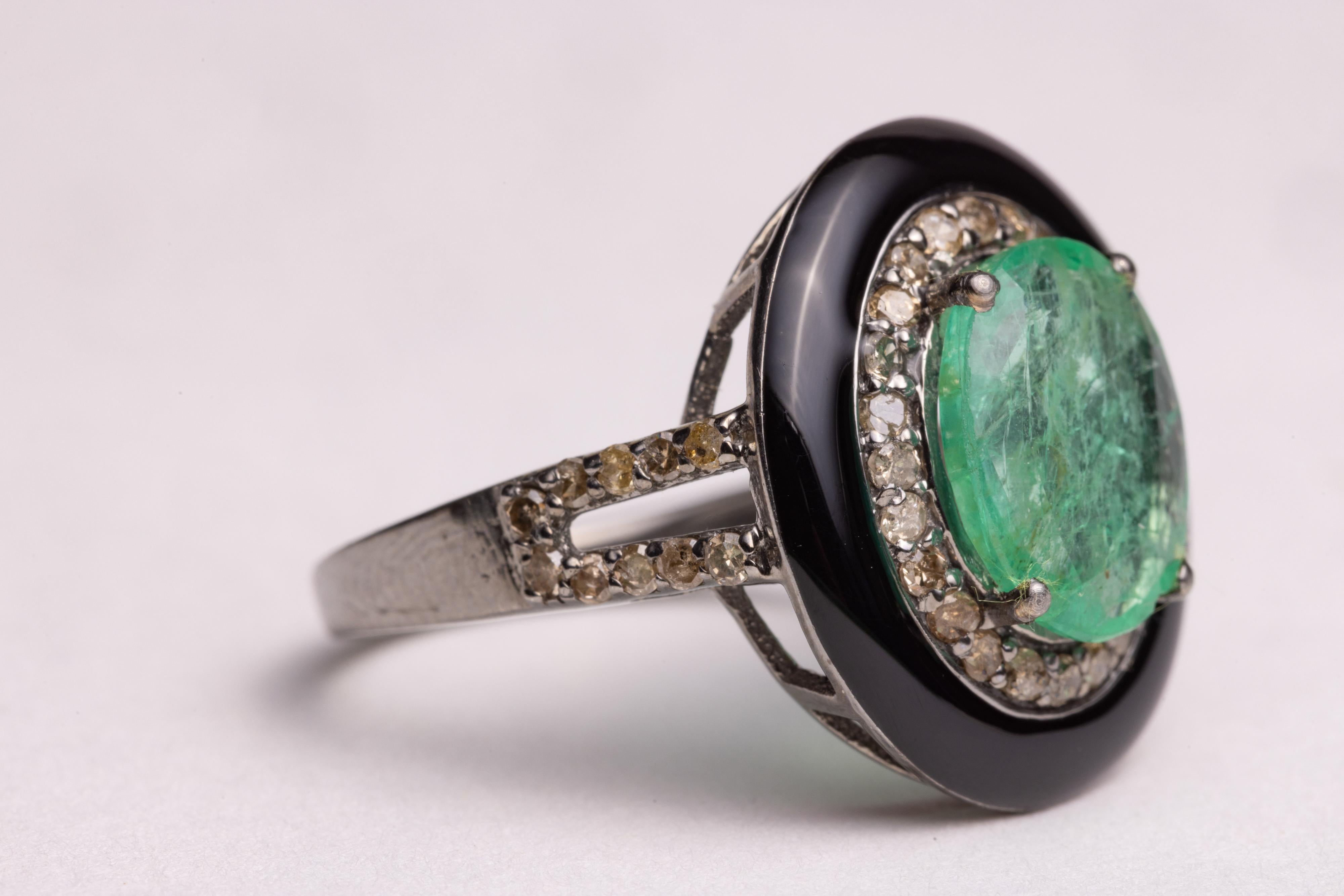 Oval Cut Emerald, Diamond and Black Onyx Ring For Sale