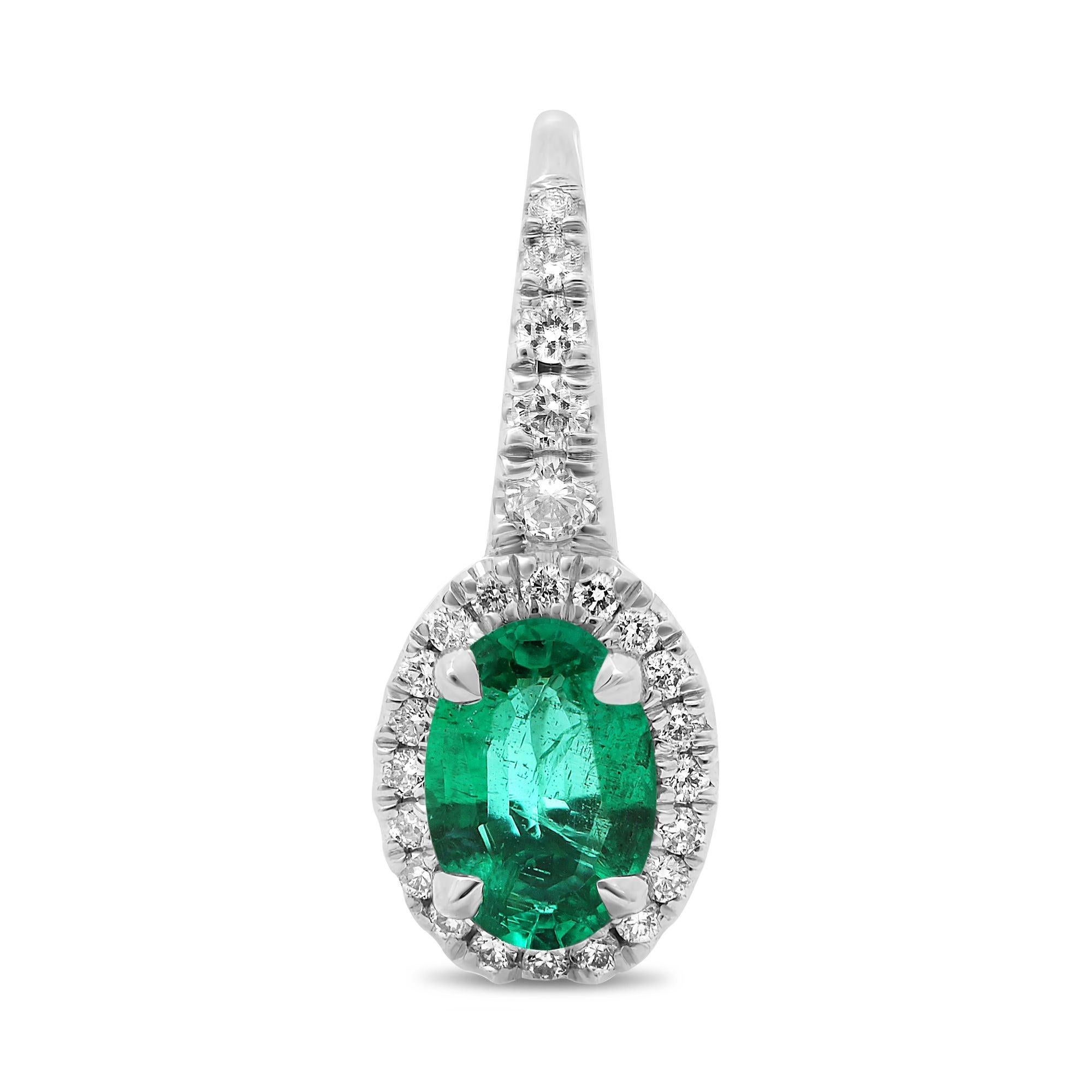 These 18 karat white gold lever back earrings feature two enchanting oval-cut emeralds totaling to 0.82 carats as the focal points with 0.19 carats of round cut white diamonds accenting in a halo style.

The two eye clean oval cut emeralds are prong