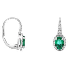 Boucles d'oreilles à levier en or blanc, émeraudes et diamants