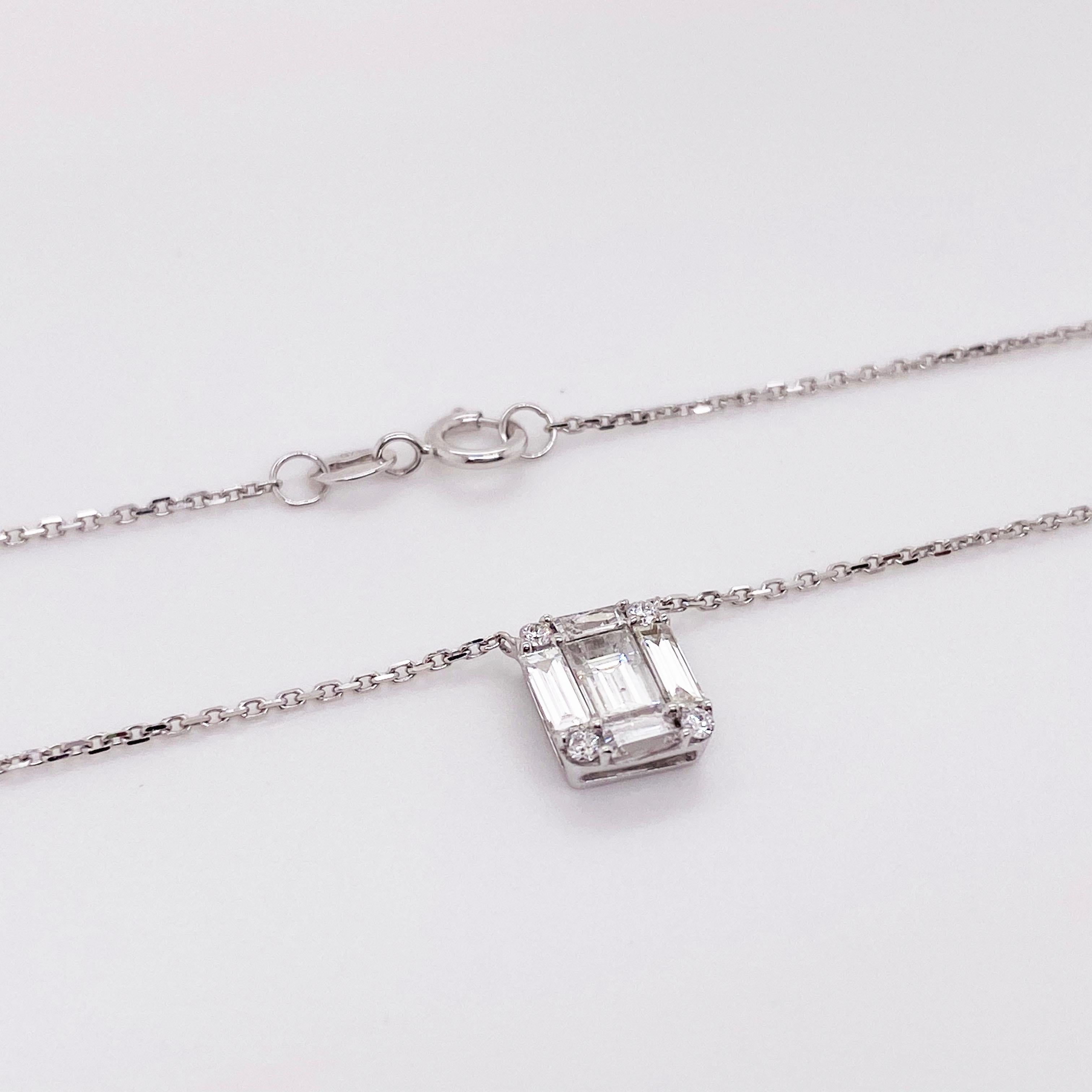 This is a very special, unique piece. This Art Deco Style designed diamond pendant is truly stunning. The emerald diamond shape is made of an emerald cut diamond set in the center with baguette diamonds framing the sides and four round brilliant