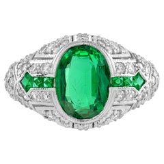 Verlobungsring im Art-Déco-Stil mit Smaragd und Diamanten, gewölbte Krone, aus 18-karätigem Weißgold