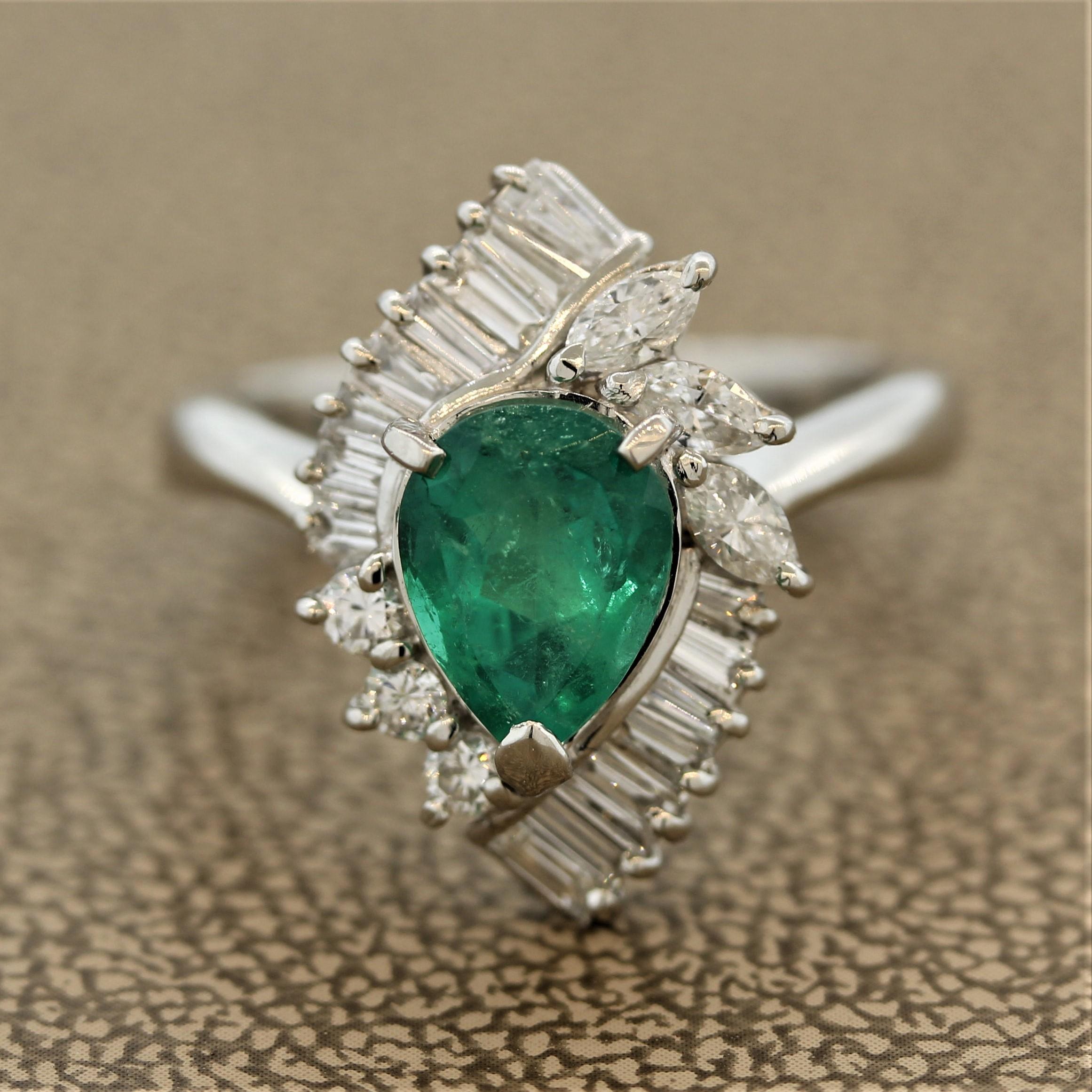 An elegant ring featuring a 1.41 carat pear shaped emerald with a fine rich green color typical of Colombian emeralds. It is surrounded by a cluster of marquise and baguette shaped diamonds weighing 0.72 carats. Hand-fabricated in platinum.

Ring