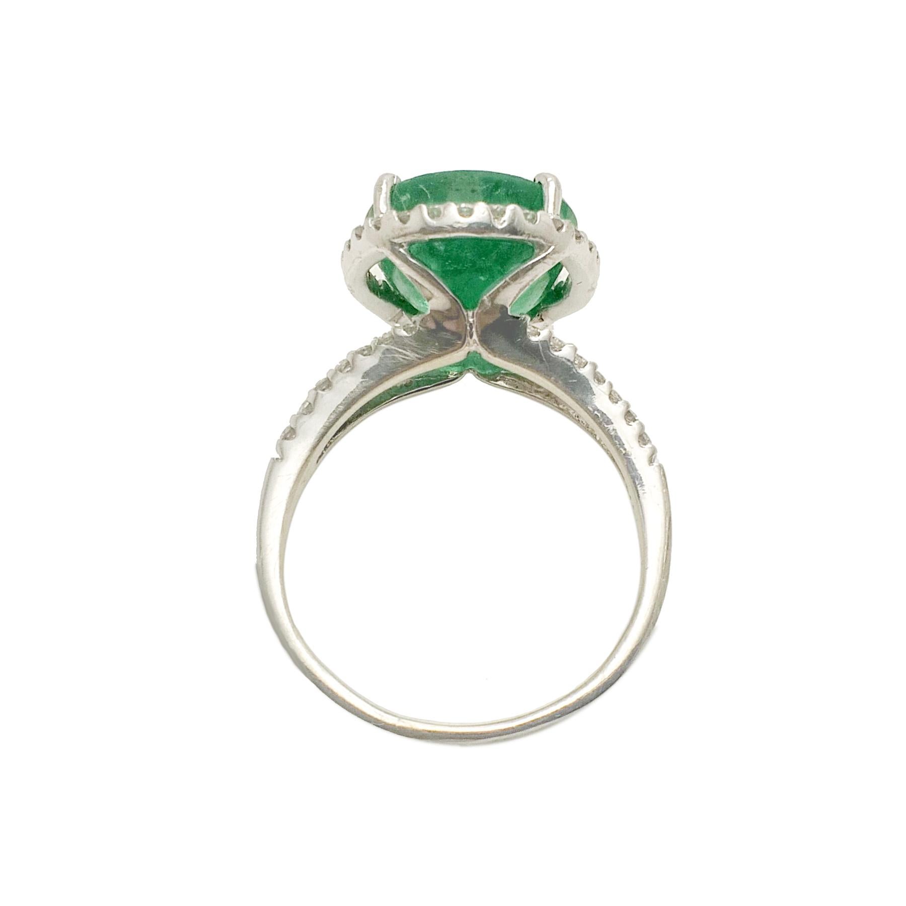 Oval Cut Emerald Diamond Cocktail Ring