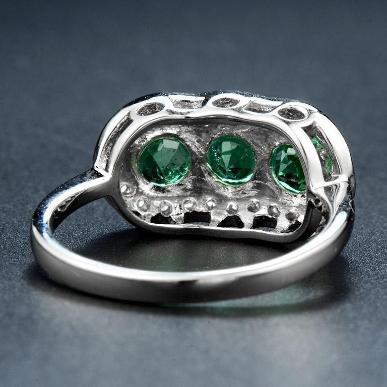 For Sale:  Round Emerald with Diamond Three Stone Ring in 18K White Gold 5